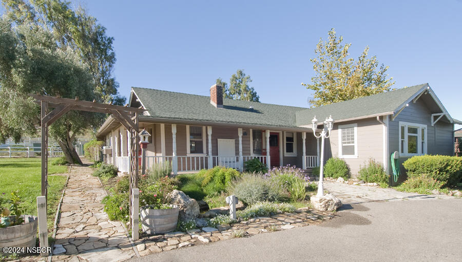 6500 Santa Rosa Road Buellton, CA 93427 - Photo 19 of 97 a front view of a house with garden