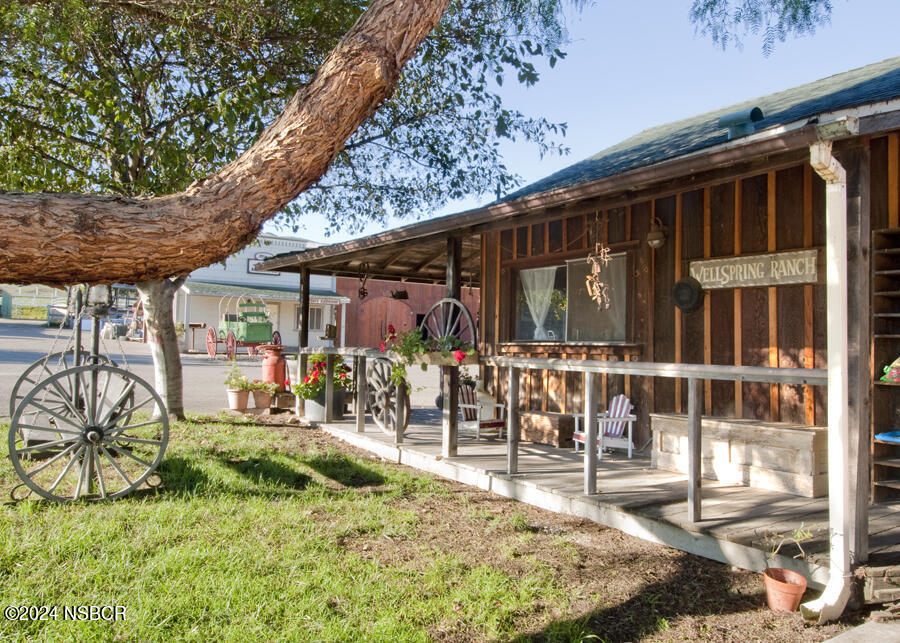 6500 Santa Rosa Road Buellton, CA 93427 - Photo 40 of 97 a view of a porch with a table and chairs