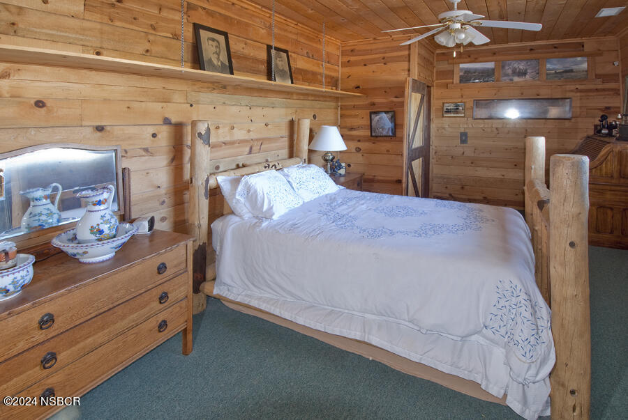 6500 Santa Rosa Road Buellton, CA 93427 - Photo 46 of 97 a bed room with a bed and a dresser