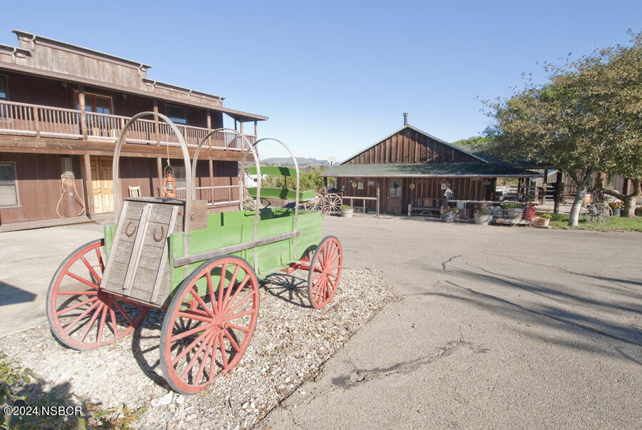 6500 Santa Rosa Road Buellton, CA 93427 - Photo 48 of 97 a view of building with an outdoor space and seating area