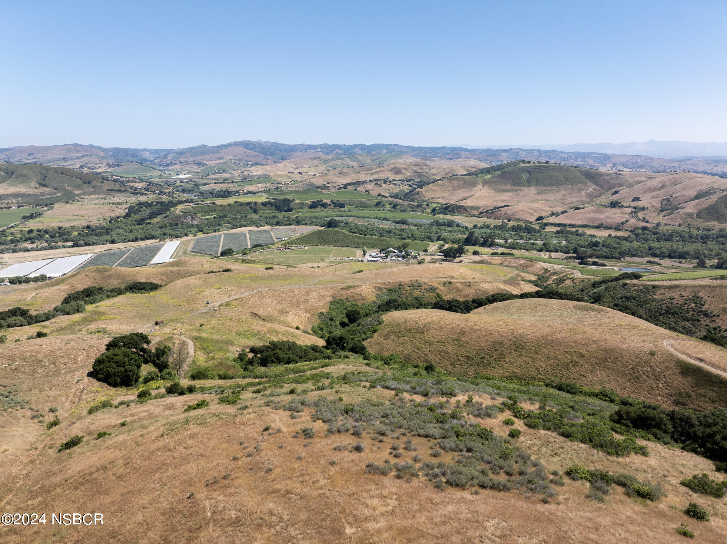 6500 Santa Rosa Road Buellton, CA 93427 - Photo 78 of 97 a view of a lake with mountains in the background