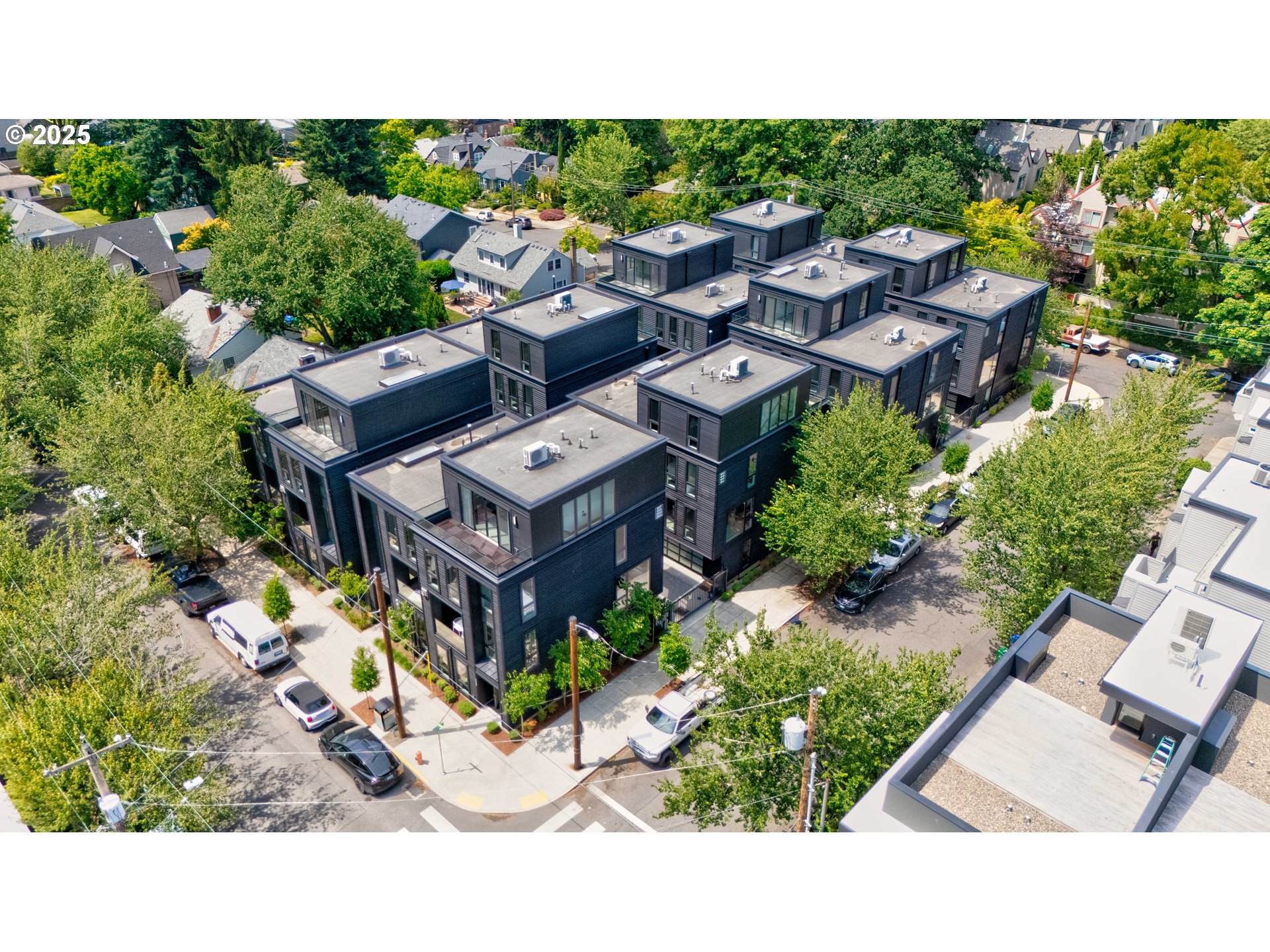 2805 Northwest Thurman Street Portland, OR 97210 - Photo 2 of 42 an aerial view of a house with a yard