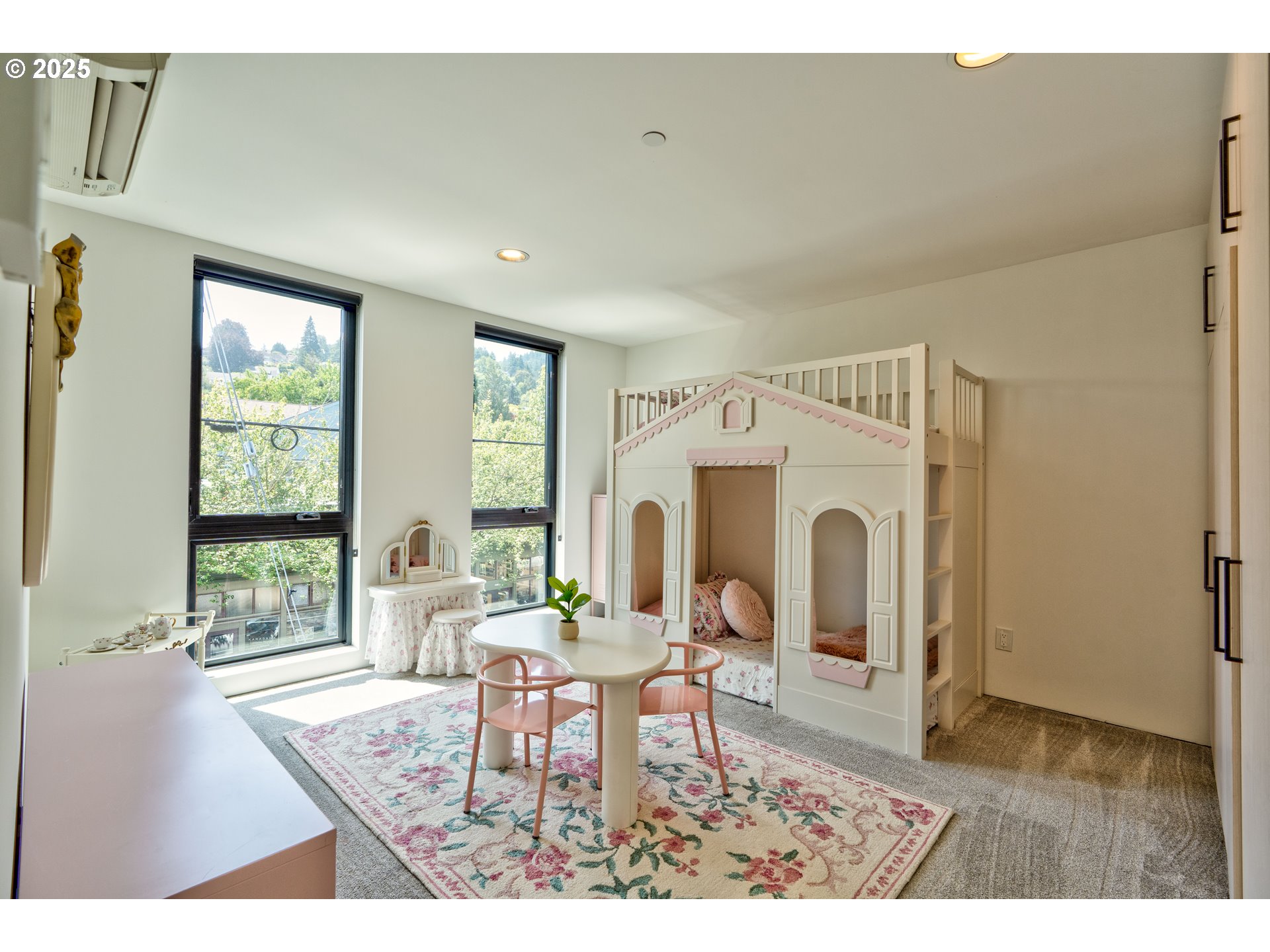 2805 Northwest Thurman Street Portland, OR 97210 - Photo 21 of 42 a living room with furniture a dining table and a fireplace