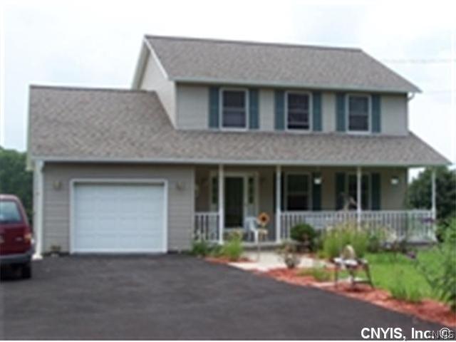 6525 Beech Tree Road Aurelius, NY 13021 - Photo 1 of 1 Exterior Front. Situated on .95 acre lot driveway