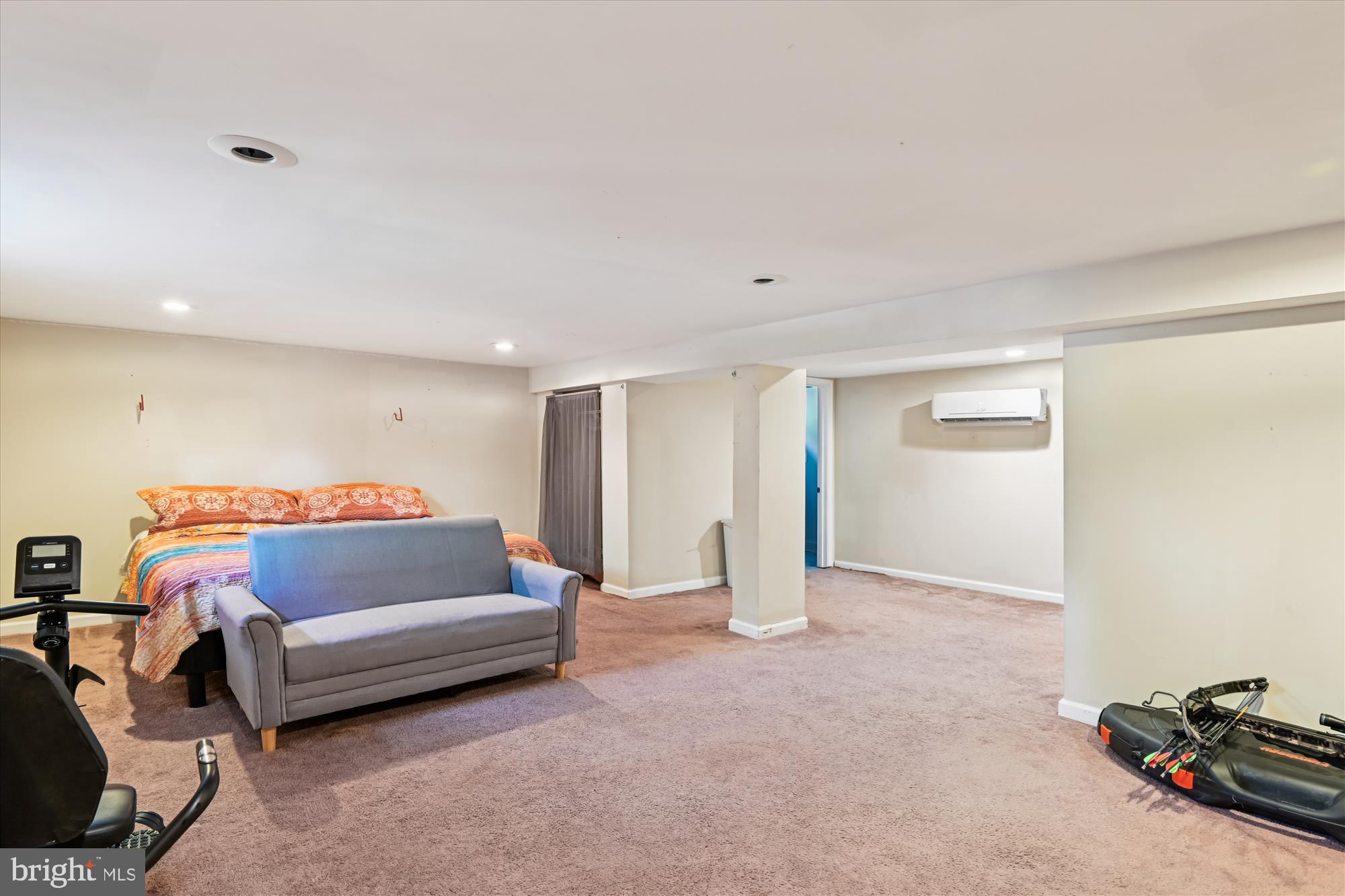 851 Annapolis Avenue Edgewater, MD 21037 - Photo 23 of 52 a bedroom with a bed and a couch