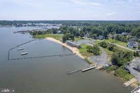 851 Annapolis Avenue Edgewater, MD 21037 - Photo 51 of 52 an aerial view of a houses with a yard and lake view