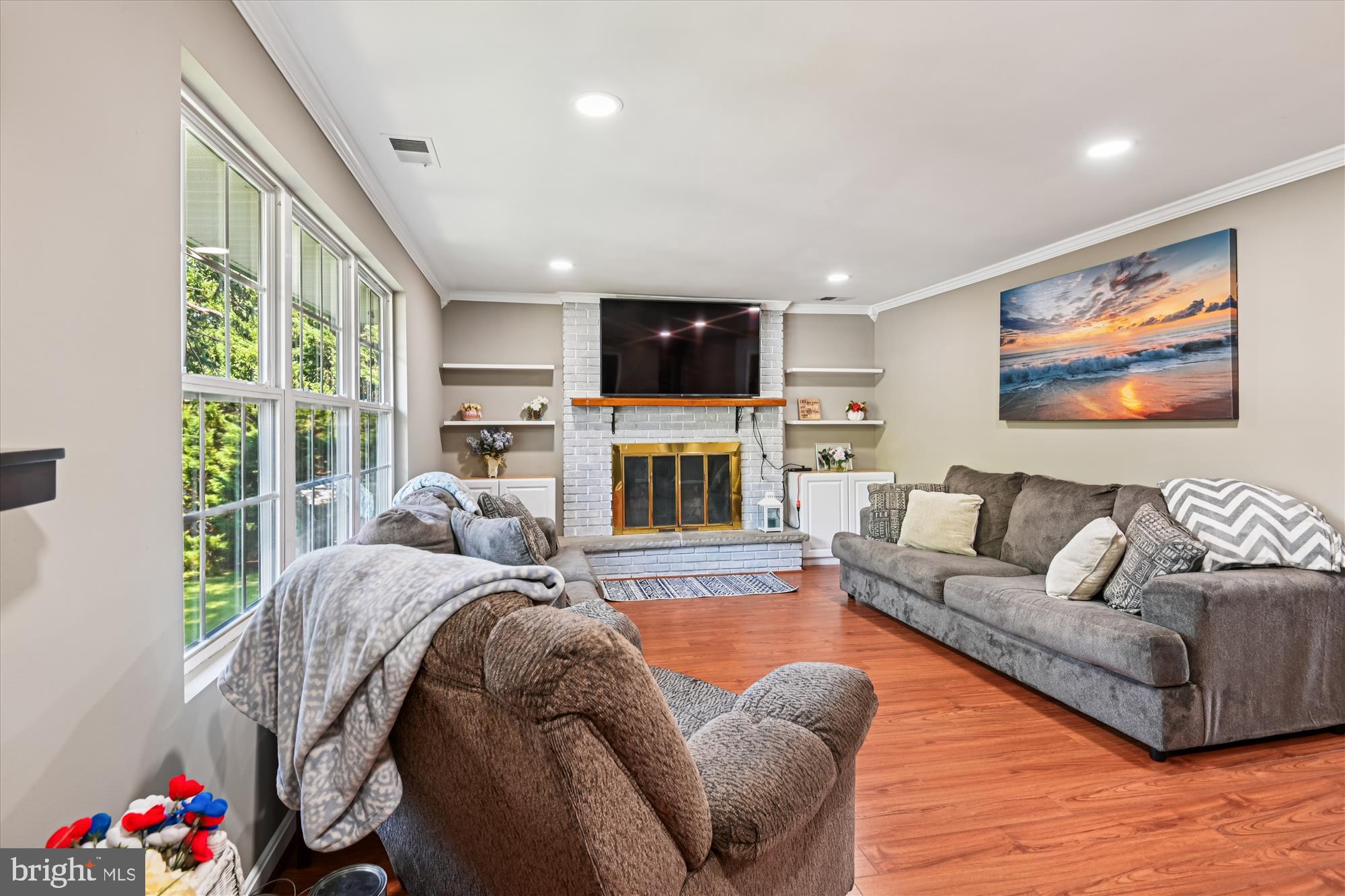 851 Annapolis Avenue Edgewater, MD 21037 - Photo 7 of 52 a living room with furniture fireplace and flat screen tv