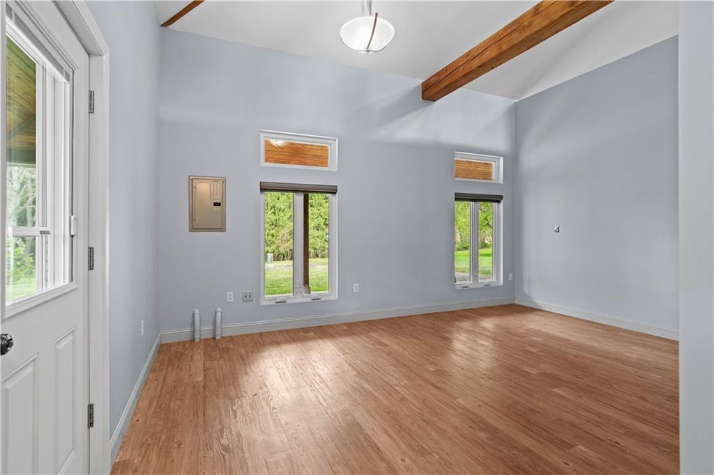 596 Wulfert Road Rochester Mills, PA 15771 - Photo 41 of 49 a view of an empty room with wooden floor and a window
