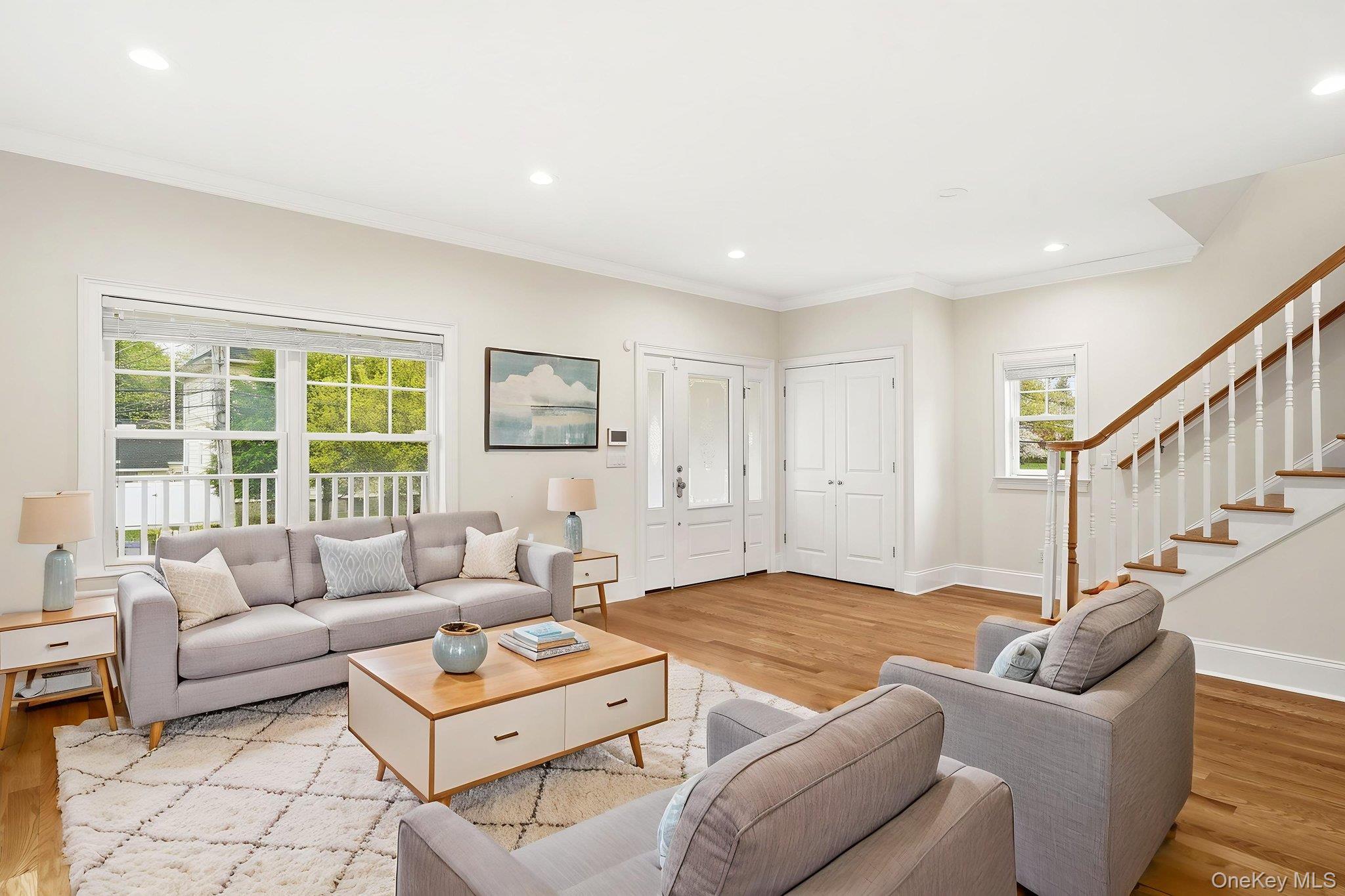 228 Central Avenue Rye, NY 10580 - Photo 2 of 24 a living room with furniture and a large window