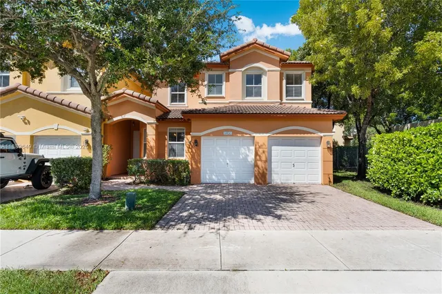 $695,000 | 8450 Northwest 113th Place, Doral, FL 33178