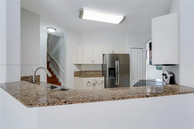 $695,000 | 8450 Northwest 113th Place, Doral, FL 33178