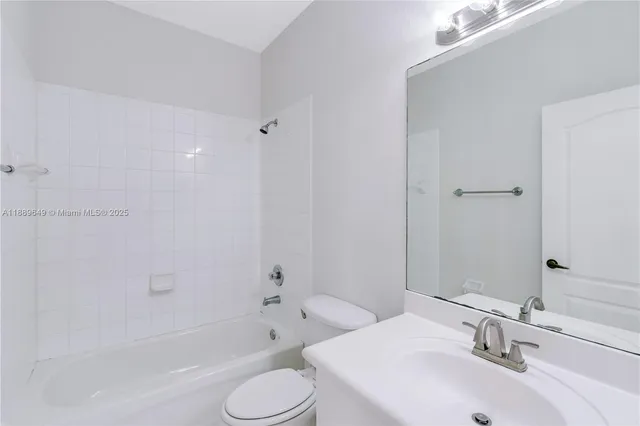 $695,000 | 8450 Northwest 113th Place, Doral, FL 33178