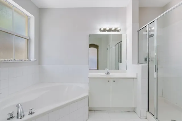 $695,000 | 8450 Northwest 113th Place, Doral, FL 33178