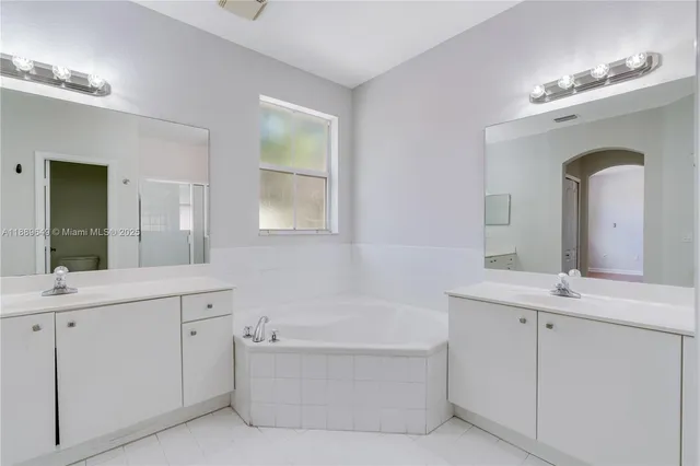 $695,000 | 8450 Northwest 113th Place, Doral, FL 33178