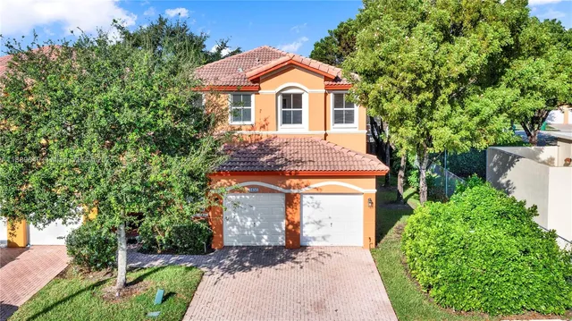 $695,000 | 8450 Northwest 113th Place, Doral, FL 33178