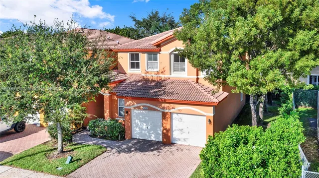 $695,000 | 8450 Northwest 113th Place, Doral, FL 33178