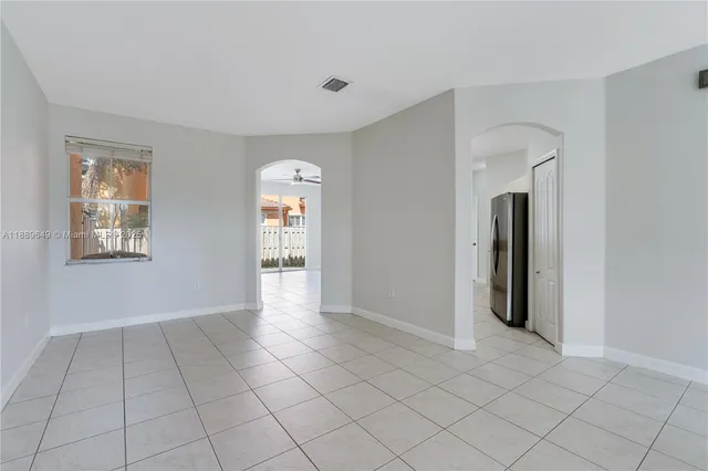 $695,000 | 8450 Northwest 113th Place, Doral, FL 33178