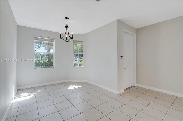 $695,000 | 8450 Northwest 113th Place, Doral, FL 33178