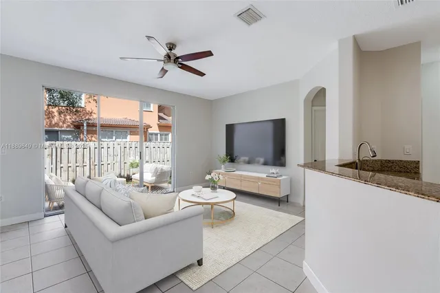 $695,000 | 8450 Northwest 113th Place, Doral, FL 33178