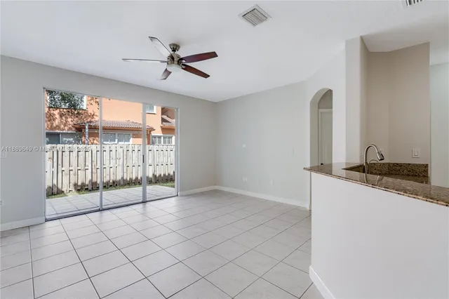 $695,000 | 8450 Northwest 113th Place, Doral, FL 33178