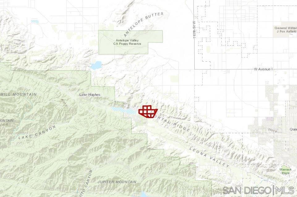 Elizabeth Lake Rd Lake Lake Elizabeth, CA 93532 - Photo 5 of 8 a view of a bathroom with shower and a signage