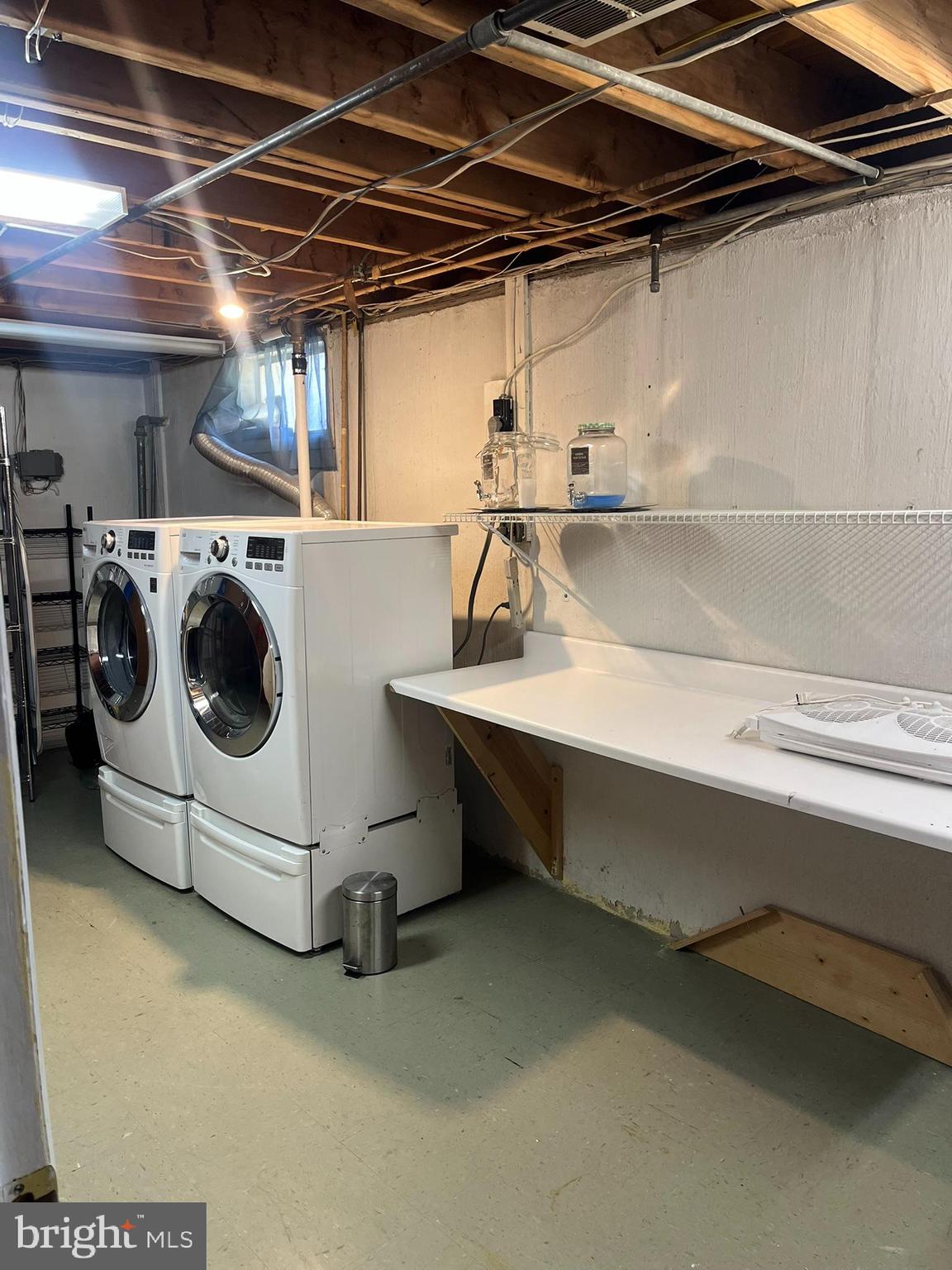 3806 Byxbee Road Randallstown, MD 21133 - Photo 16 of 18 a utility room with dryer and washer