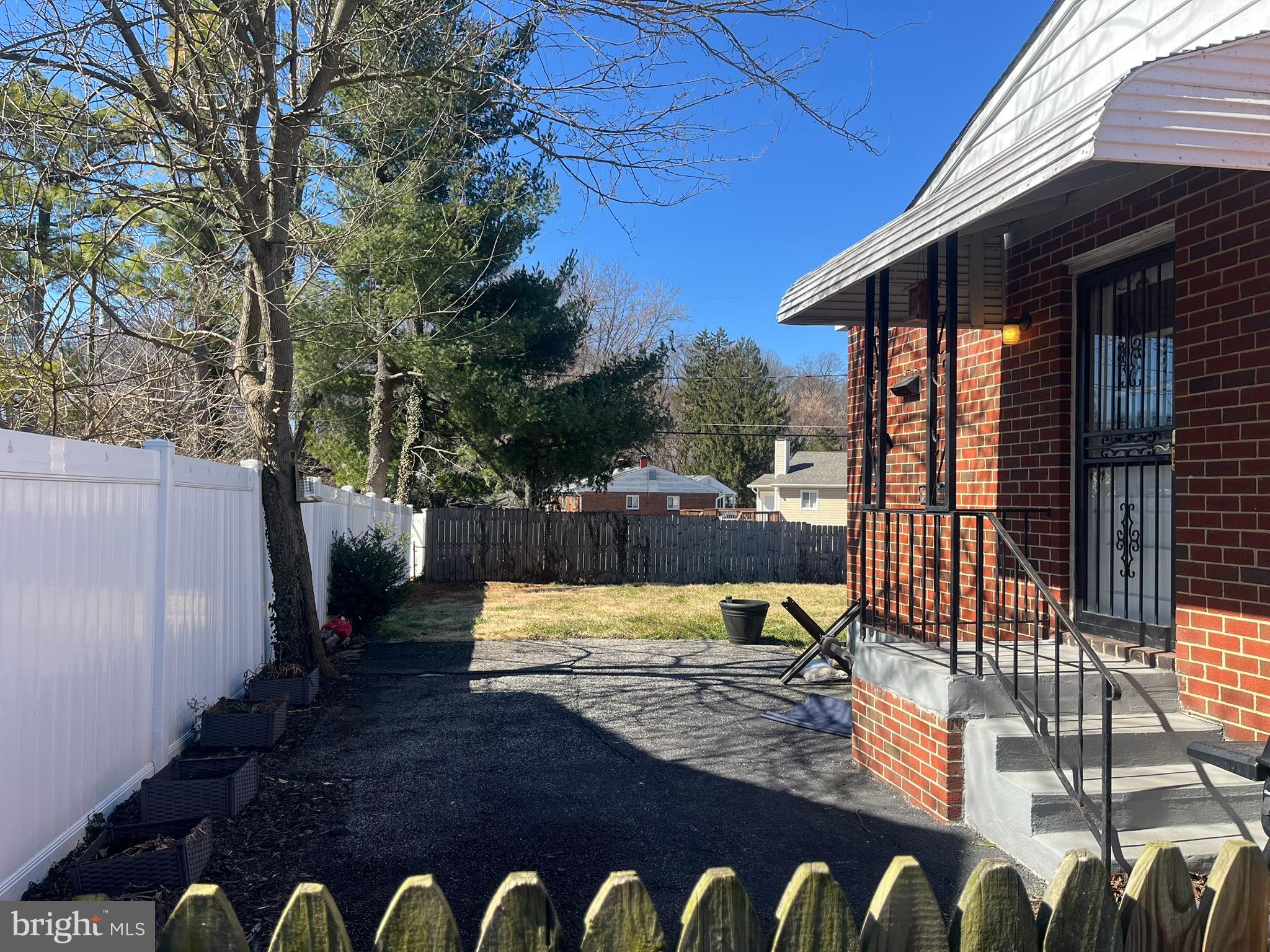 3806 Byxbee Road Randallstown, MD 21133 - Photo 17 of 18 a view of a chairs and fire pit in the patio