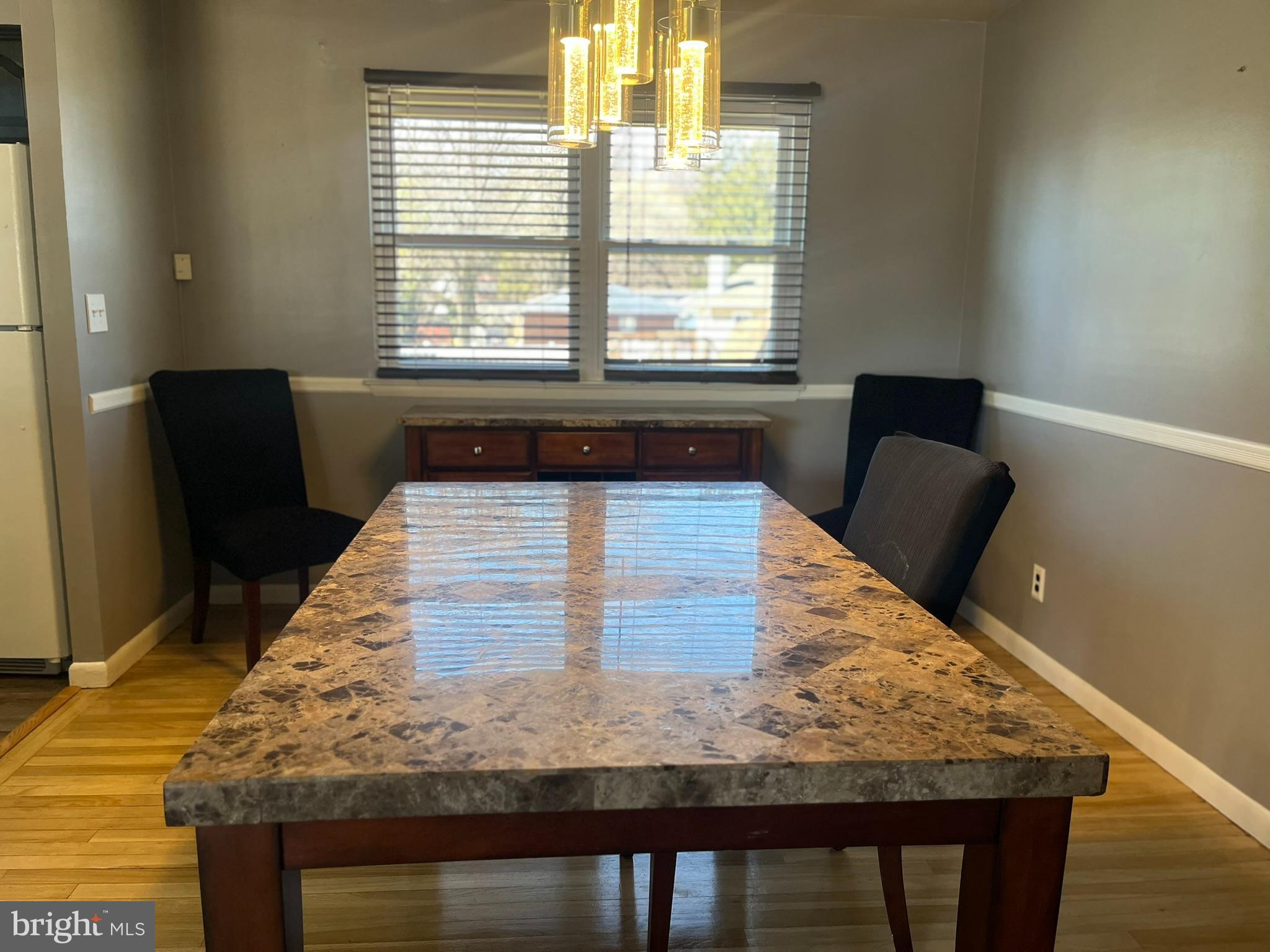 3806 Byxbee Road Randallstown, MD 21133 - Photo 6 of 18 a view of a living room and kitchen