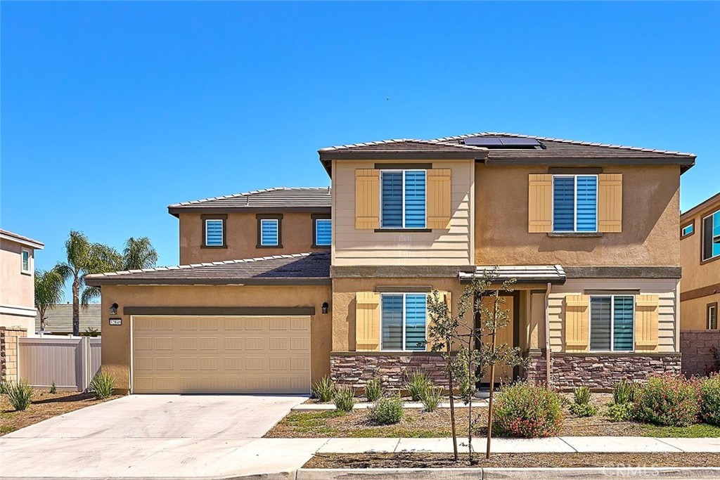 32846 Forgecroft Street Menifee, CA 92584 - Photo 1 of 48 a front view of a house