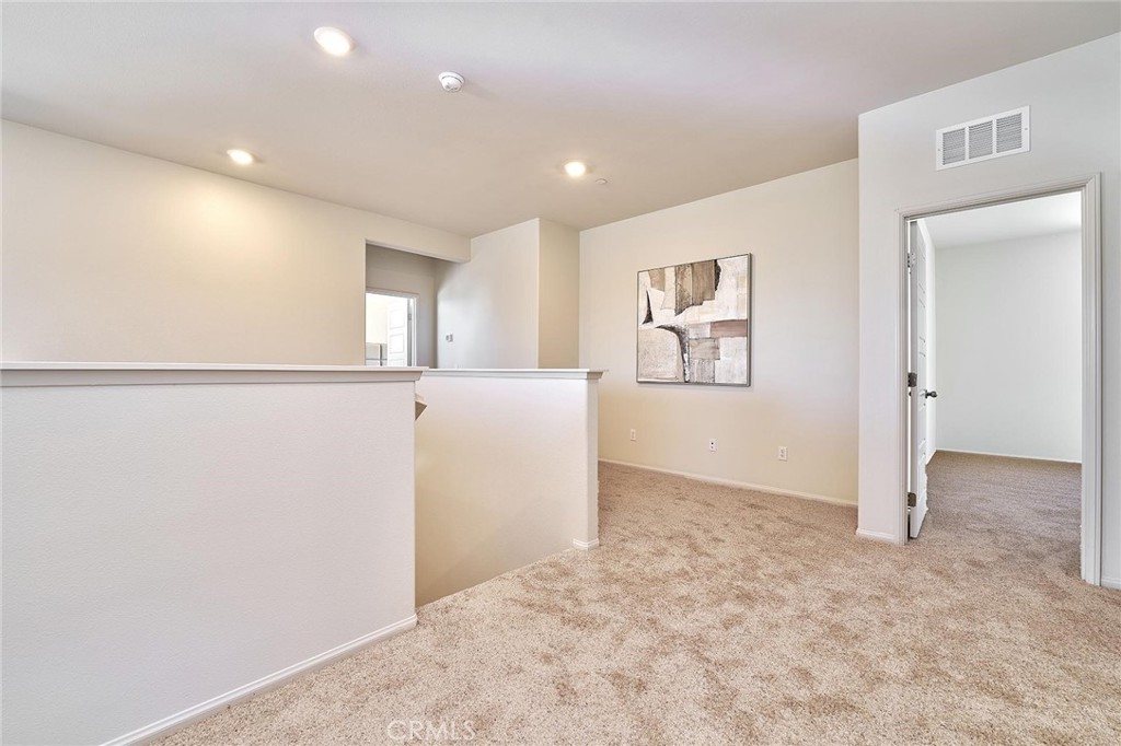 32846 Forgecroft Street Menifee, CA 92584 - Photo 20 of 48 a view of an empty room