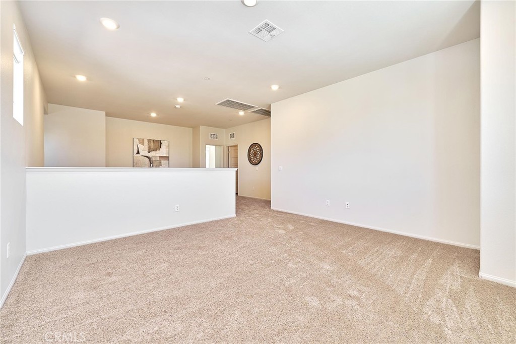 32846 Forgecroft Street Menifee, CA 92584 - Photo 21 of 48 a view of an empty room