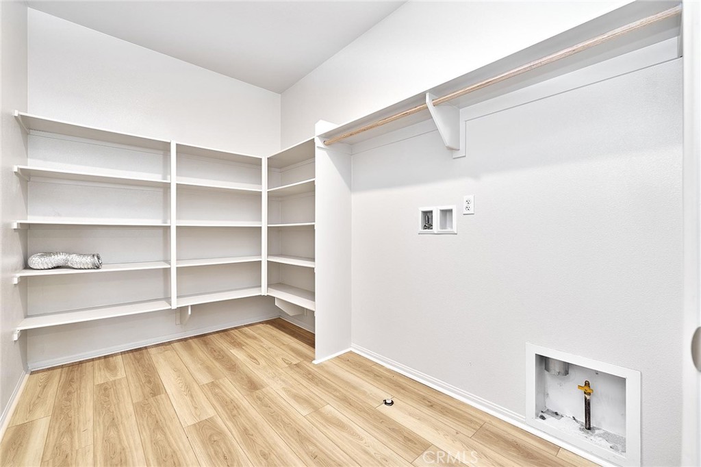 32846 Forgecroft Street Menifee, CA 92584 - Photo 33 of 48 a view of an empty room with empty racks