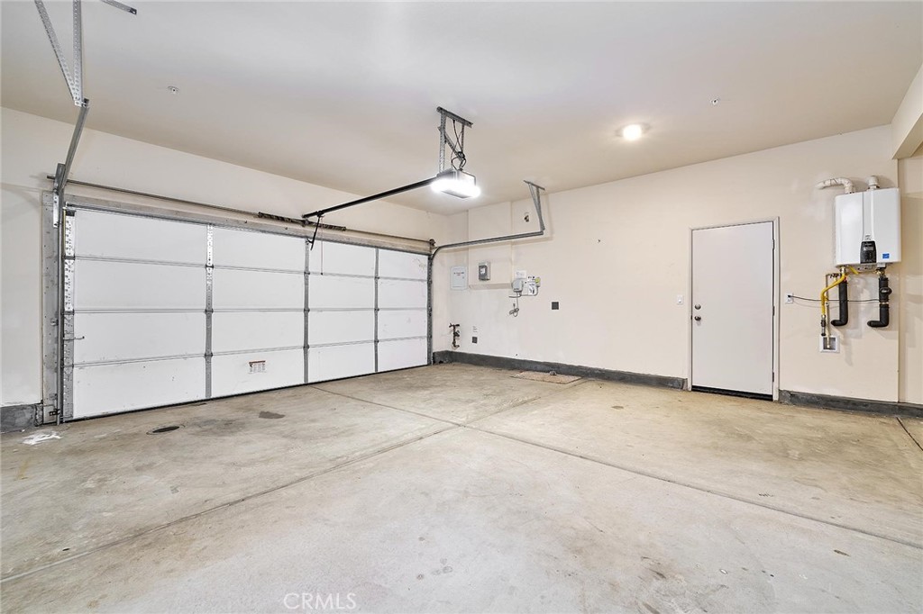 32846 Forgecroft Street Menifee, CA 92584 - Photo 34 of 48 a view of a garage