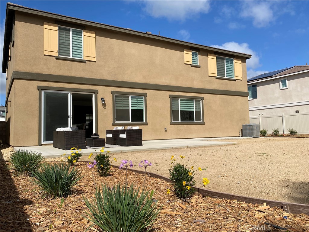 32846 Forgecroft Street Menifee, CA 92584 - Photo 36 of 48 a view of a house with snow on the road