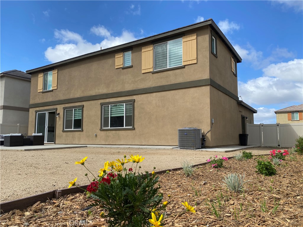 32846 Forgecroft Street Menifee, CA 92584 - Photo 39 of 48 a front view of a house with a yard