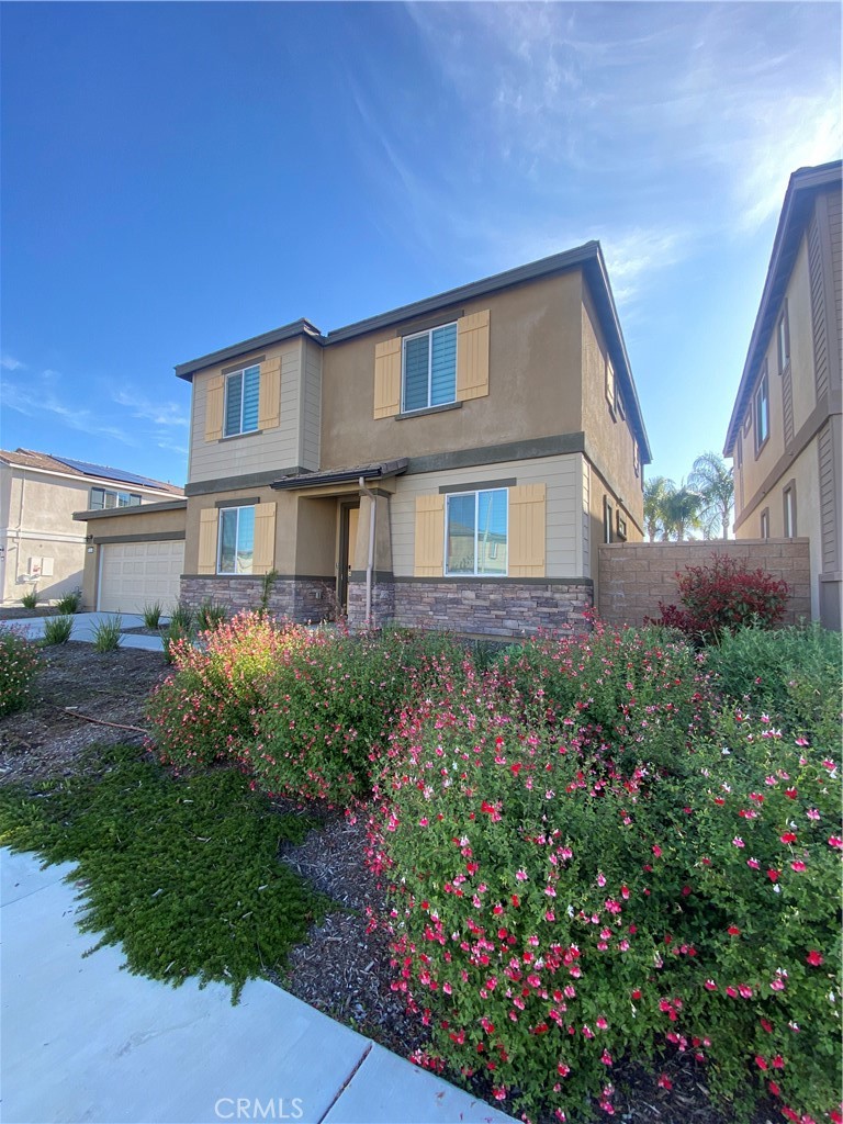 32846 Forgecroft Street Menifee, CA 92584 - Photo 42 of 48 front view of a house with a yard