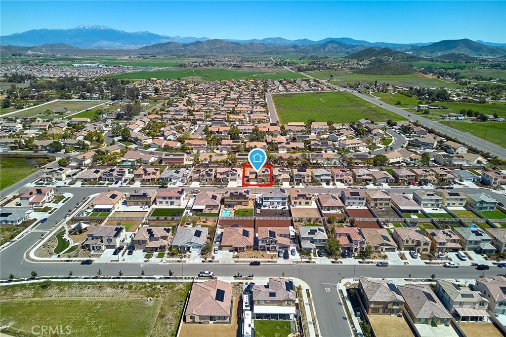32846 Forgecroft Street Menifee, CA 92584 - Photo 47 of 48 an aerial view of residential houses with outdoor space
