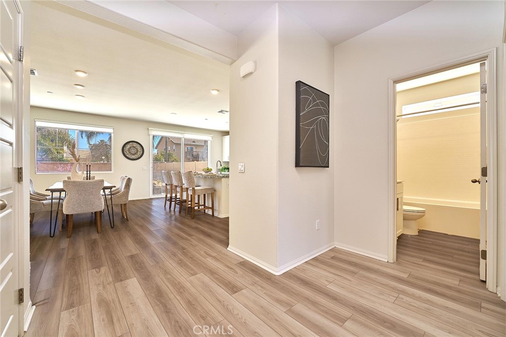 32846 Forgecroft Street Menifee, CA 92584 - Photo 6 of 48 a view of livingroom with furniture and wooden floor