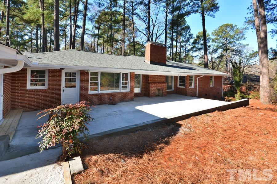 402 Monticello Avenue Durham, NC 27707 - Photo 12 of 24 a front view of a house with garden