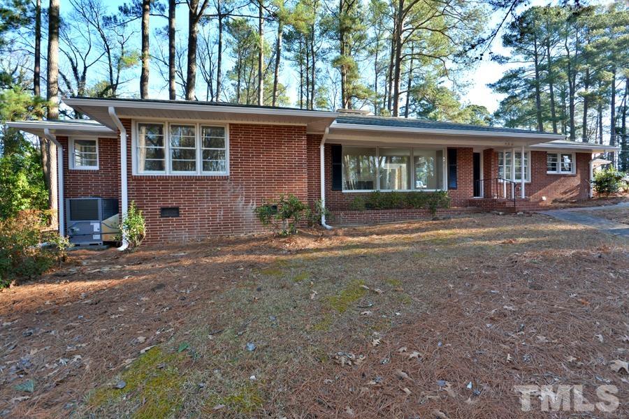 402 Monticello Avenue Durham, NC 27707 - Photo 3 of 24 a front view of a house with garden