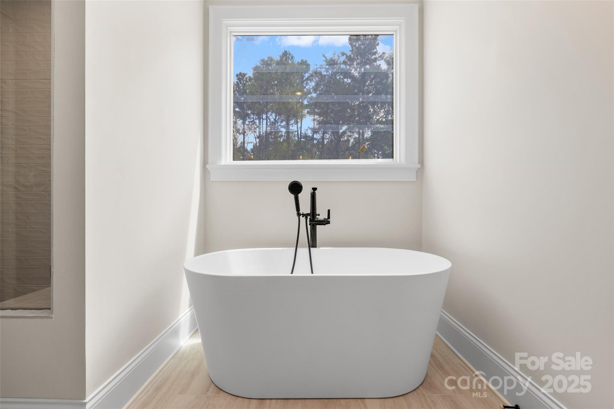 537 Riddle Mill Road Clover, SC 29710 - Photo 27 of 47 a white bath tub sitting in a bathroom