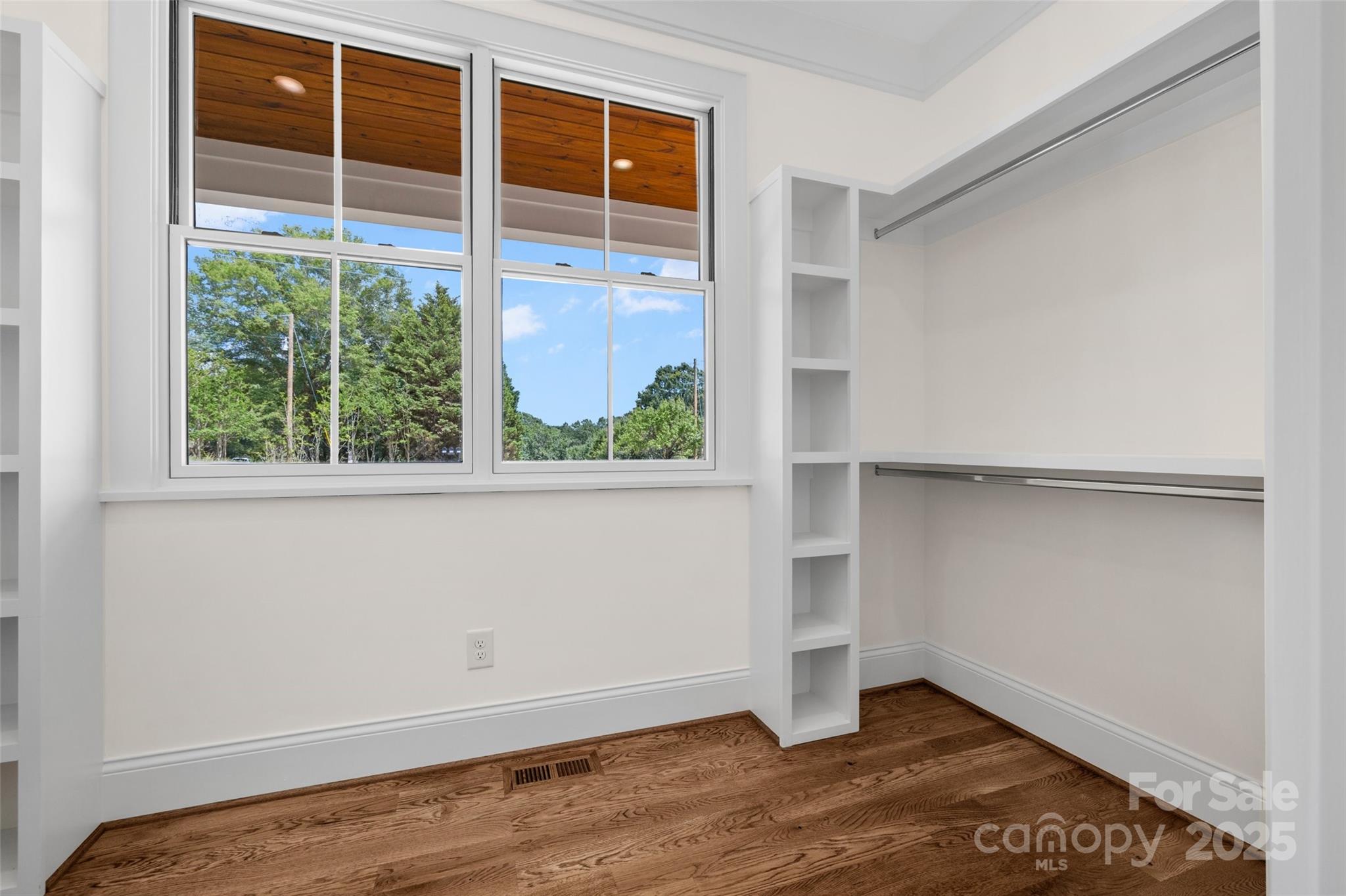 537 Riddle Mill Road Clover, SC 29710 - Photo 29 of 47 a view of an empty room with wooden floor and a window