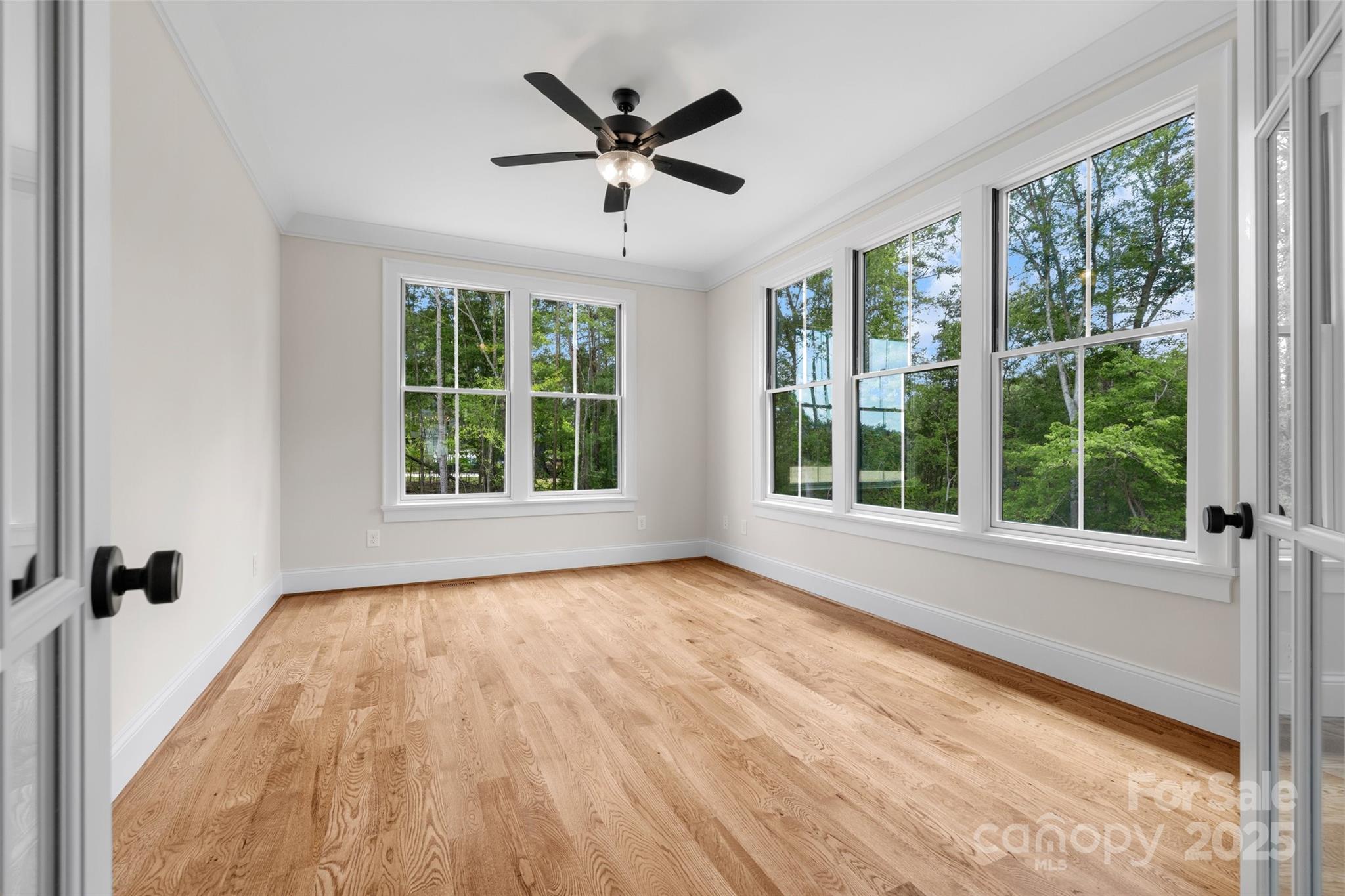 537 Riddle Mill Road Clover, SC 29710 - Photo 30 of 47 a view of a livingroom with a ceiling fan and a large window