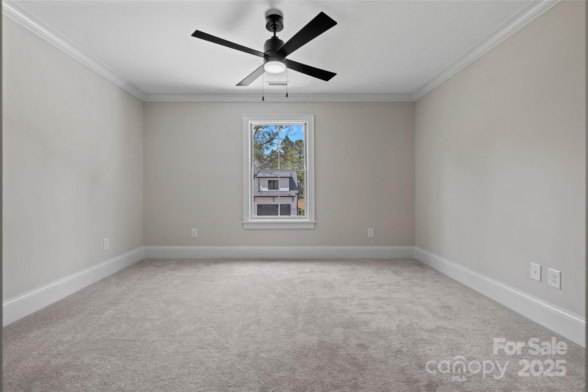 537 Riddle Mill Road Clover, SC 29710 - Photo 36 of 47 an empty room with a window and a fan