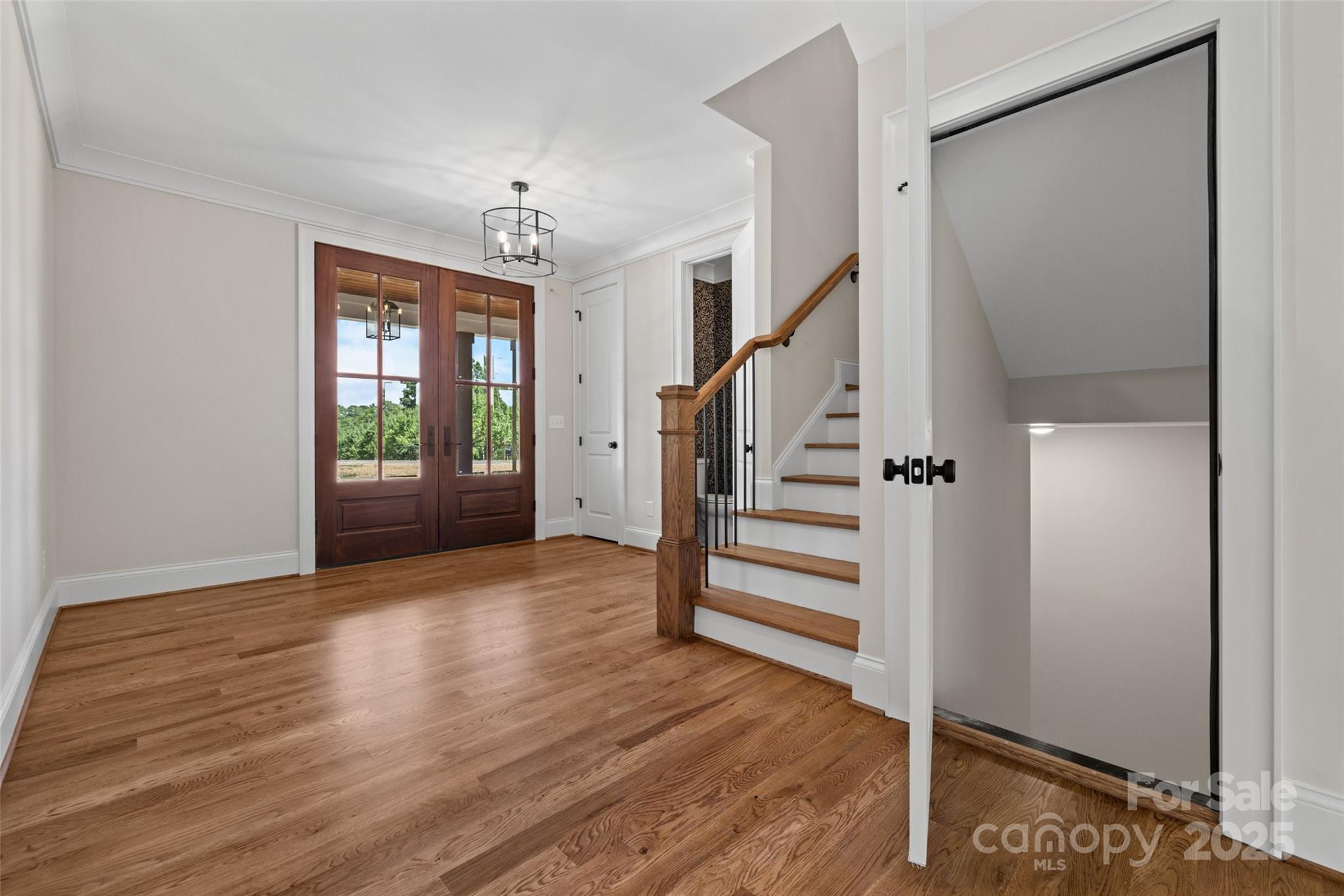 537 Riddle Mill Road Clover, SC 29710 - Photo 4 of 47 a view of entryway with stairs and wooden floor