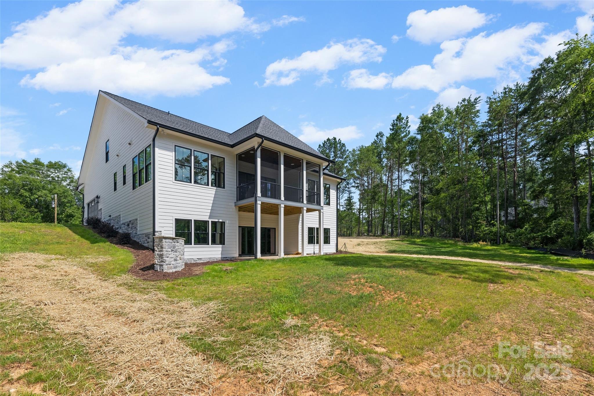 537 Riddle Mill Road Clover, SC 29710 - Photo 42 of 47 a front view of a house with garden