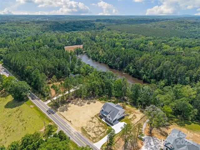 a view of a yard with an outdoor seating