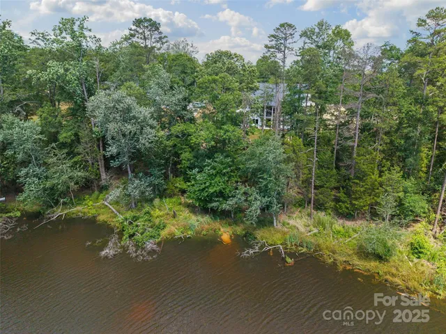 a view of a lake with a houses