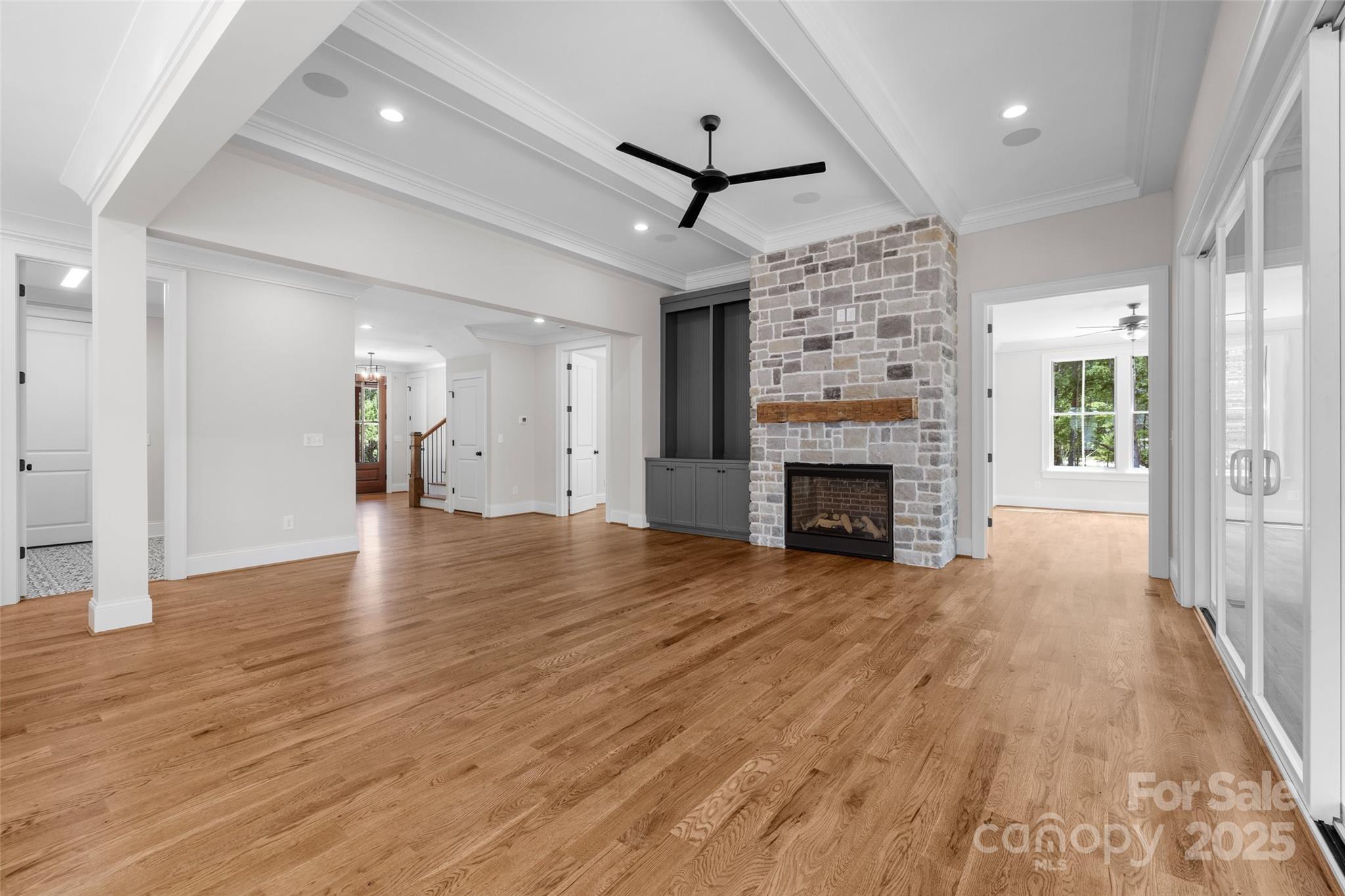 537 Riddle Mill Road Clover, SC 29710 - Photo 7 of 47 a view of a livingroom with wooden floor a fireplace and window