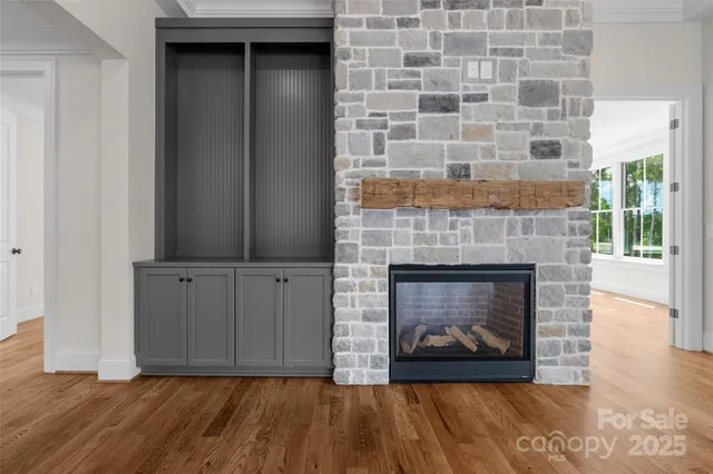a living room with a fireplace